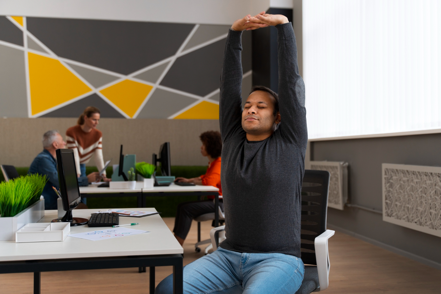 Office relaxation exercises with neck rolls