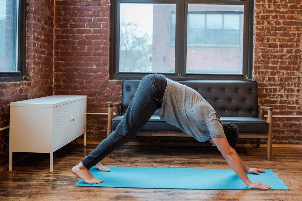 Yoga for beginners with downward dog pose